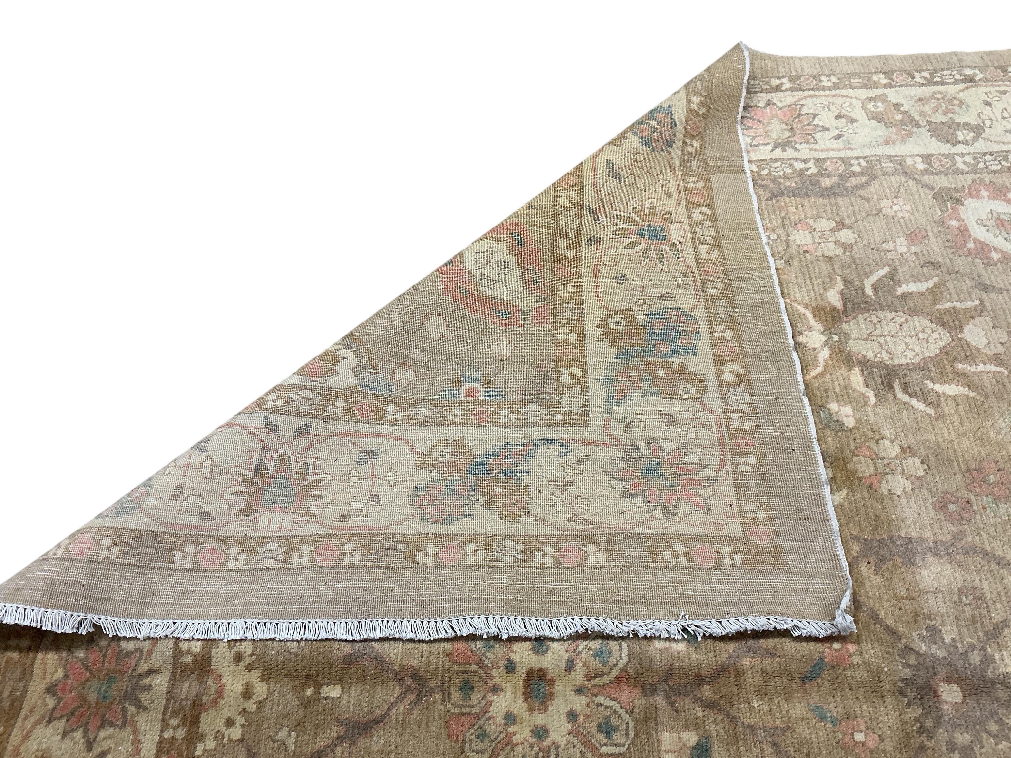 A Persian carpet, 370 x 255cm